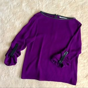 Alice & Olivia leather trim roll sleeve top